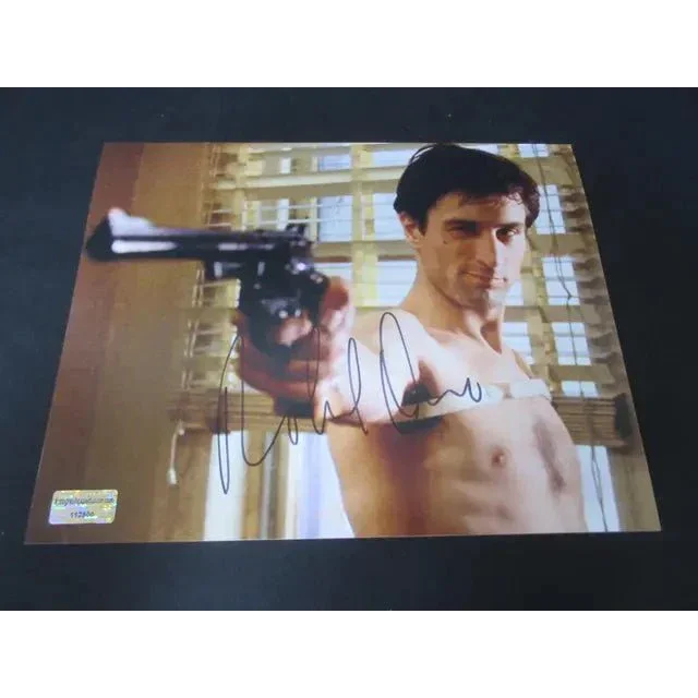 Autographed Robert De Niro signed 8x10 photo as Travis Bickle holding a revolver