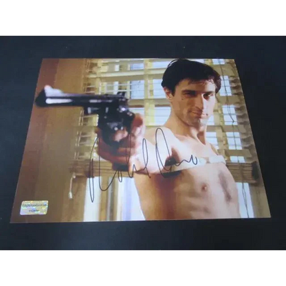 Autographed Robert De Niro signed 8x10 photo as Travis Bickle holding a revolver