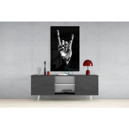 Bold black and white rock hand gesture glass wall art with skull design
