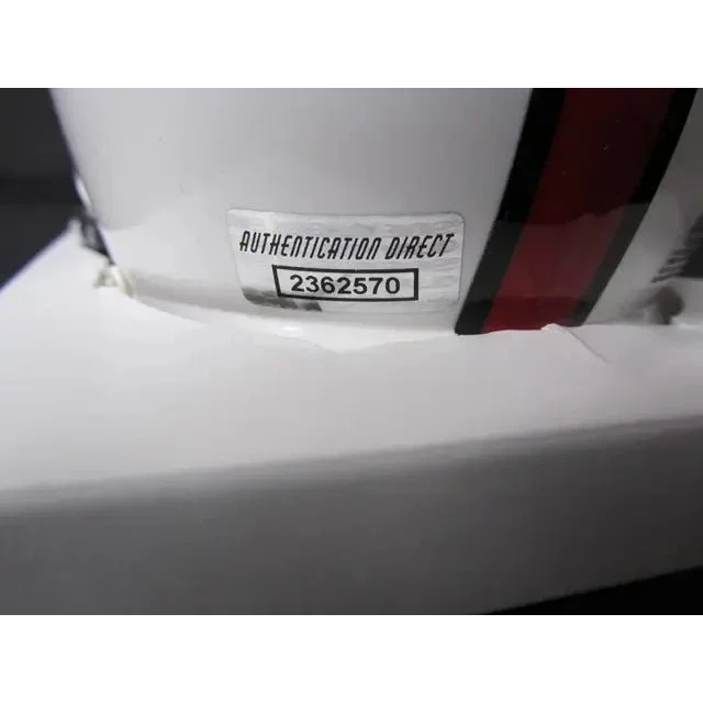 White helmet with authentication sticker from Roger Staubach signed HOF mini helmet collectible