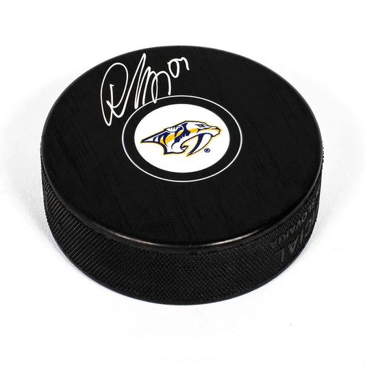 Roman Josi autographed Nashville Predators hockey puck with saber-toothed cat logo
