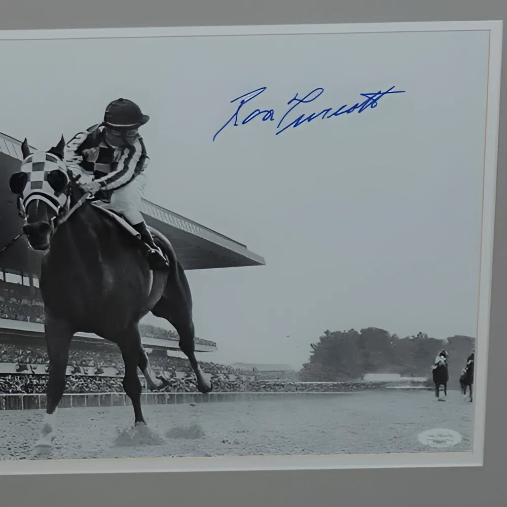 Black-and-white ron turcotte photo of jockey in checkered silks signed in blue ink deluxe framed 11x14 photo