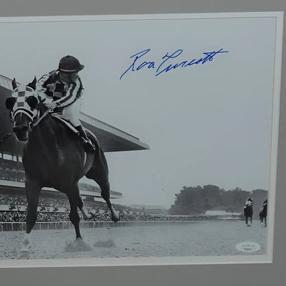 Black-and-white ron turcotte photo of jockey in checkered silks signed in blue ink deluxe framed 11x14 photo