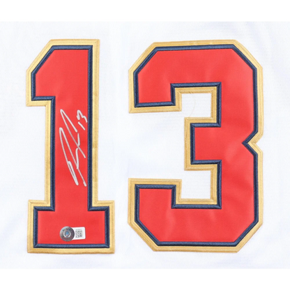 Red and blue number 13 jersey patch with signature from Ronald Acuna World Series jersey