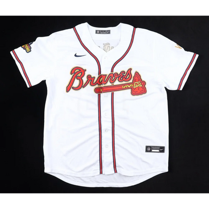 White Atlanta Braves jersey with red trim and world series patch signed by Ronald Acuna