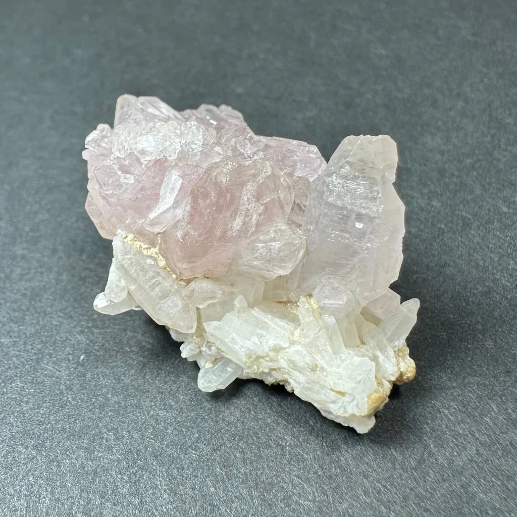 Rose quartz cluster from Brazil: translucent pink quartz crystals
