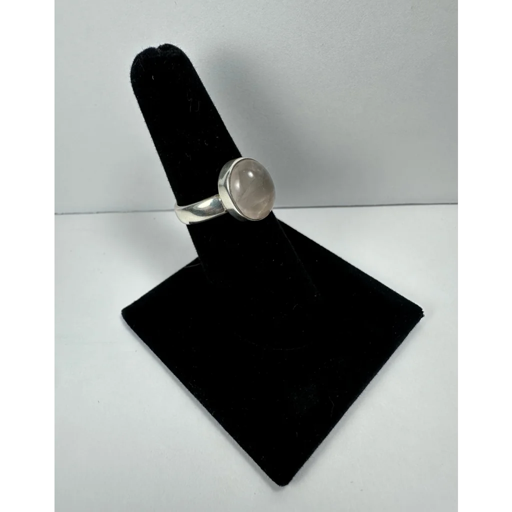 Sleek silver rose quartz ring with oval stone in minimalist band