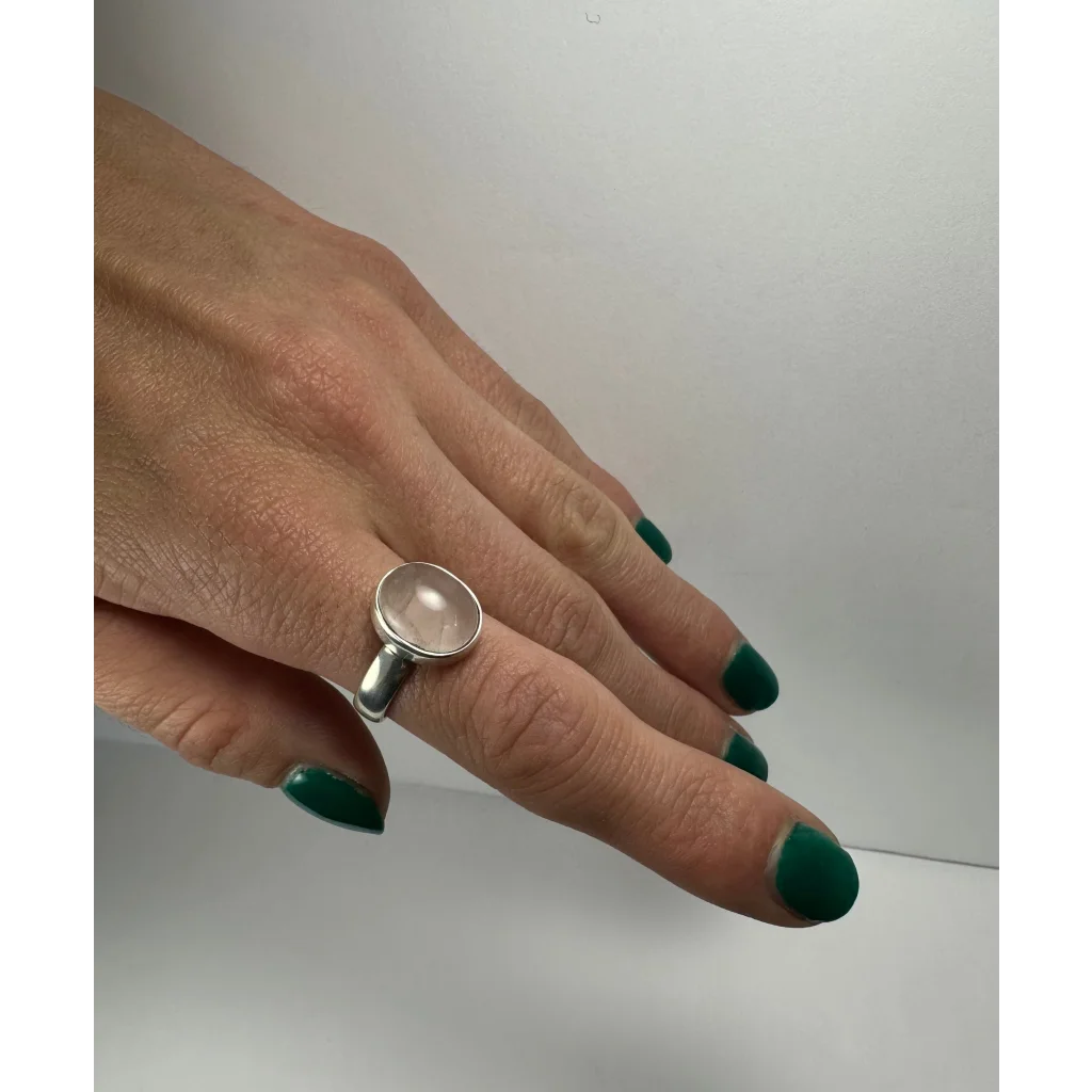 Sleek silver rose quartz ring with oval stone in minimalist band