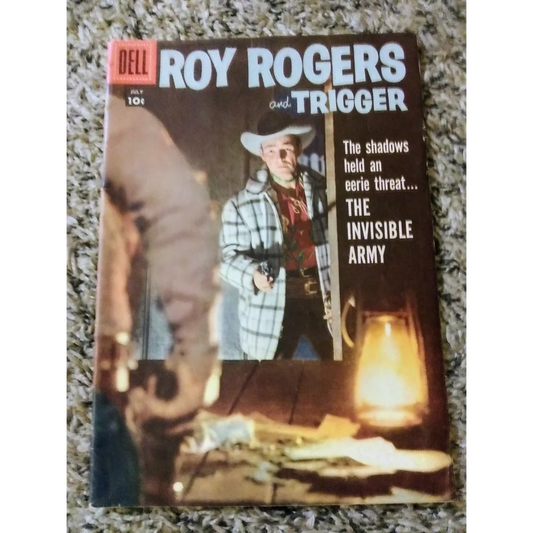 1950s Roy Rogers Dell Comics cover: cowboy in plaid shirt and hat with gun