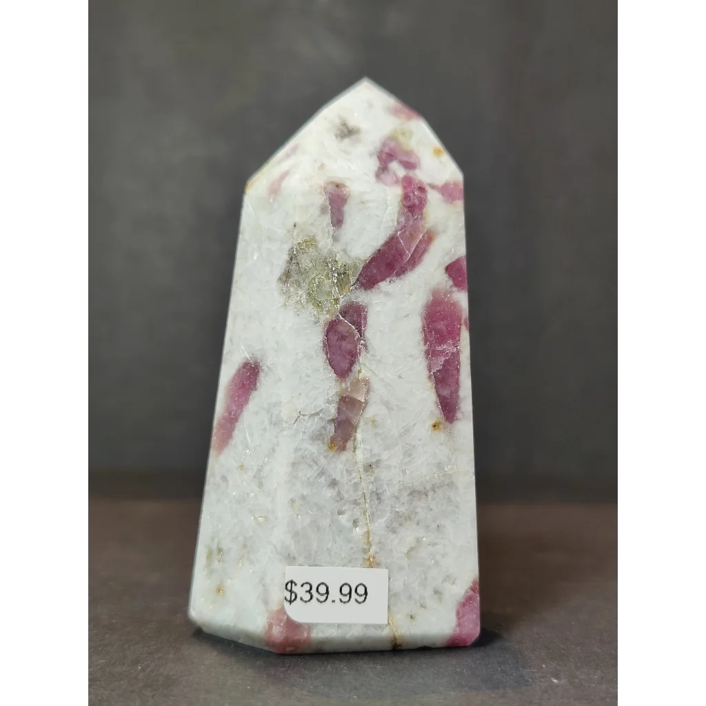 Rubellite pink tourmaline in quartz polished obelisk tower sculpture with gold fleck inclusions and pointed top