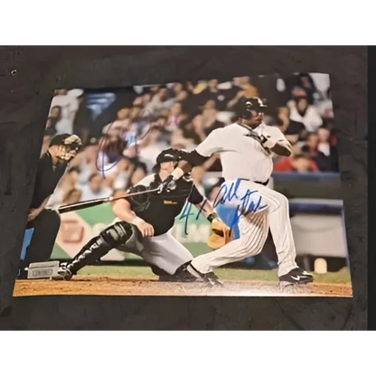 Autographed 8x10 photo of Ruben Sierra in baseball action shot with players and umpire