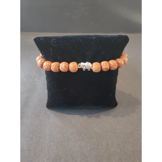 Rudraksha seed beaded bracelet with silver elephant charm