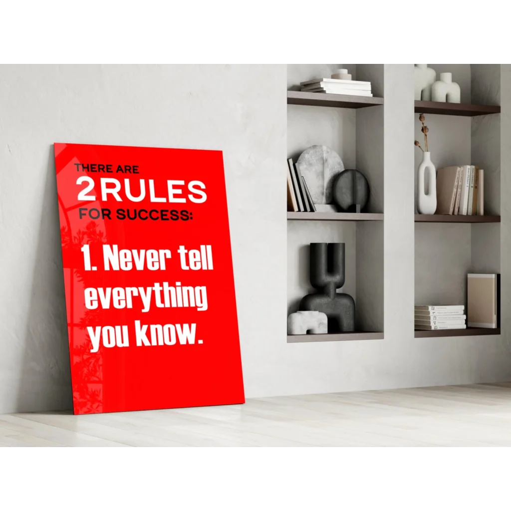 Vibrant red glass wall art canvas with bold white text: There are 2 rules for success: 1