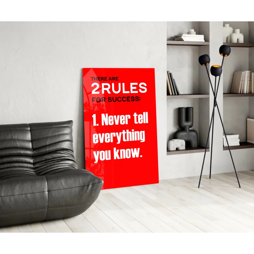 Vibrant red motivational glass wall art with bold white text: there are 2 rules for success: 1