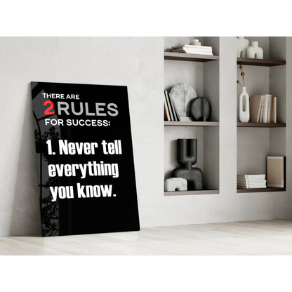 Black motivational glass wall art with bold white and red text on success rules