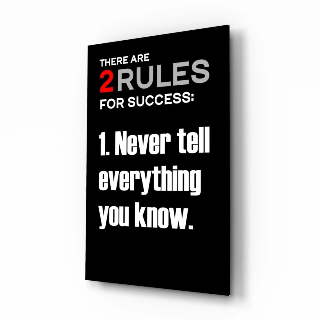 Bold 2 rules for success glass wall art with white red text on black canvas