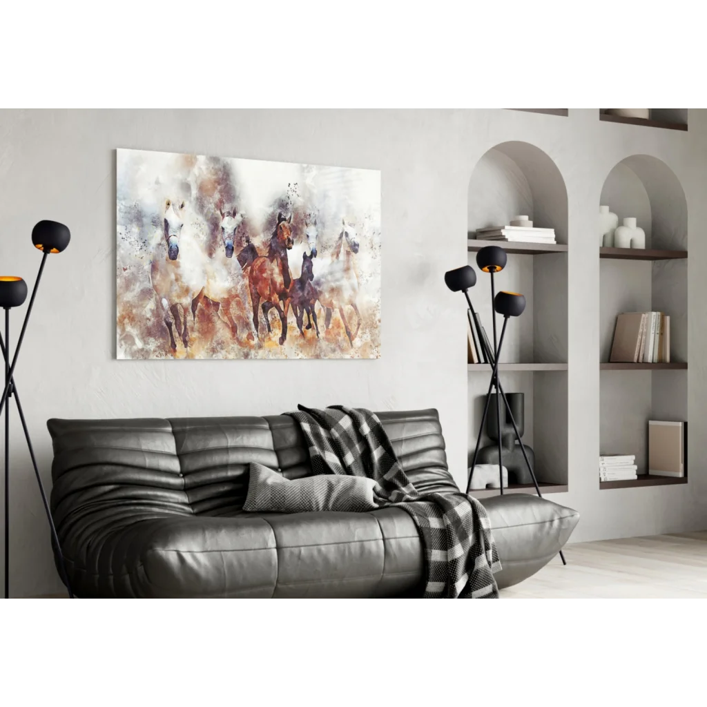 Modern black leather sofa with gray plaid throw and glass wall art