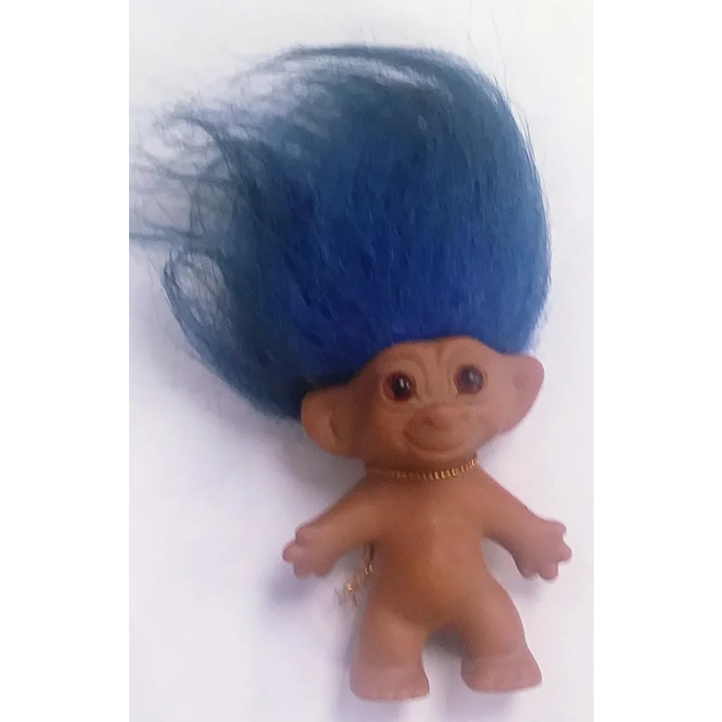 Vintage Russ troll doll with blue hair, gold necklace and lucky horseshoe charm