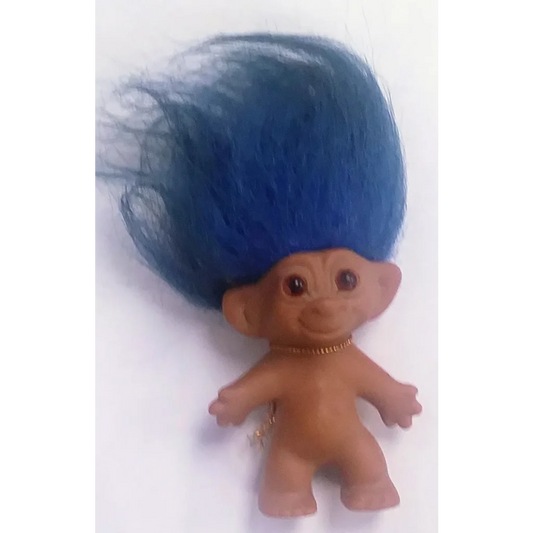 Vintage Russ troll doll with blue hair, gold necklace and lucky horseshoe charm