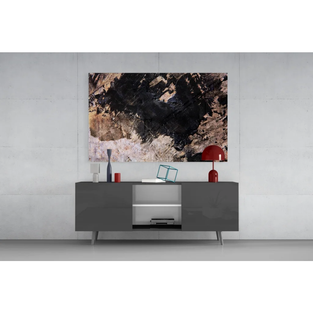 Vibrant red dome lamp on bold abstract textured wall art in earthy black tones