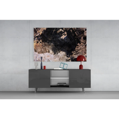 Vibrant red dome lamp on bold abstract textured wall art in earthy black tones