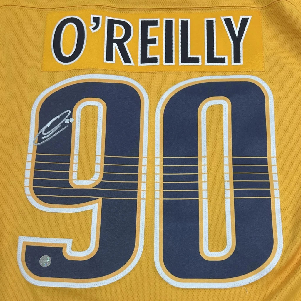 Ryan O’Reilly autographed Nashville Predators gold #90 jersey