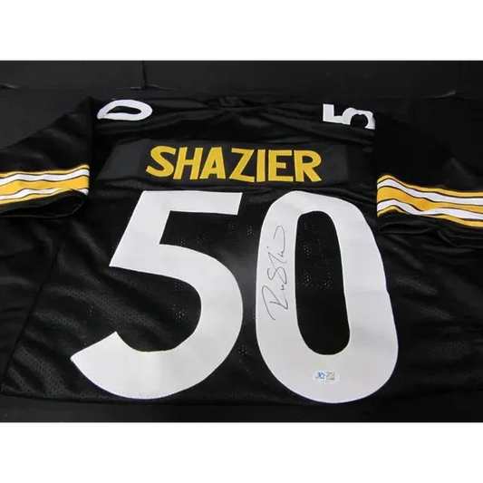Black Pittsburgh Steelers signed jersey with white numbers, yellow lettering, autographed by Ryan Shazier