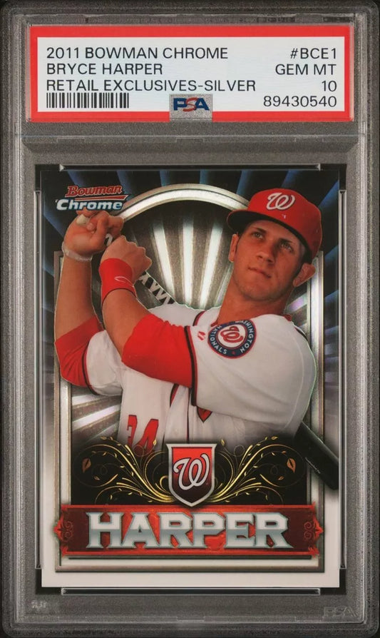 PSA-graded baseball card in plastic case showing Bryce Harper in red Nationals uniform swinging bat against dark background.