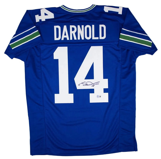 Blue Seattle Seahawks football jersey number 14 with Darnold name and signature, displayed flat against white background.