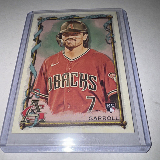 Purple-bordered trading card showing Corbin Carroll in red Diamondbacks uniform number 7, encased in plastic sleeve.