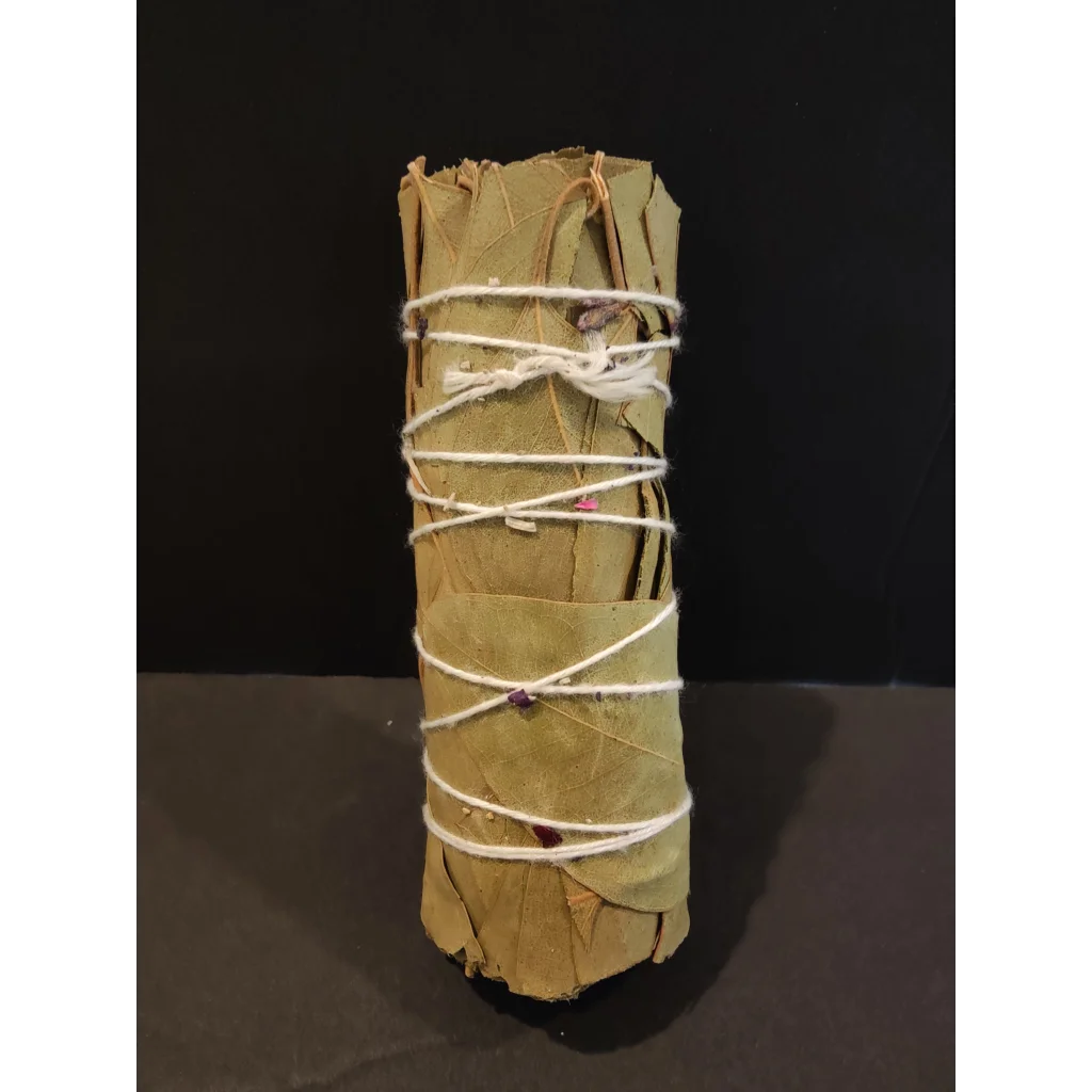 4-inch sage bundle smudge stick of dried light green leaves tied with white twine