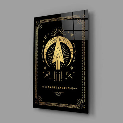 Gold-embossed Sagittarius zodiac on black glass wall art with geometric starburst