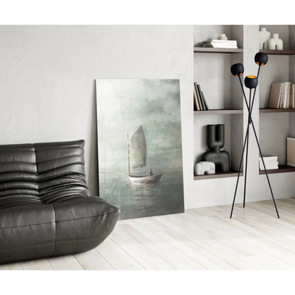 Modern sailboat wall art over black leather sofa
