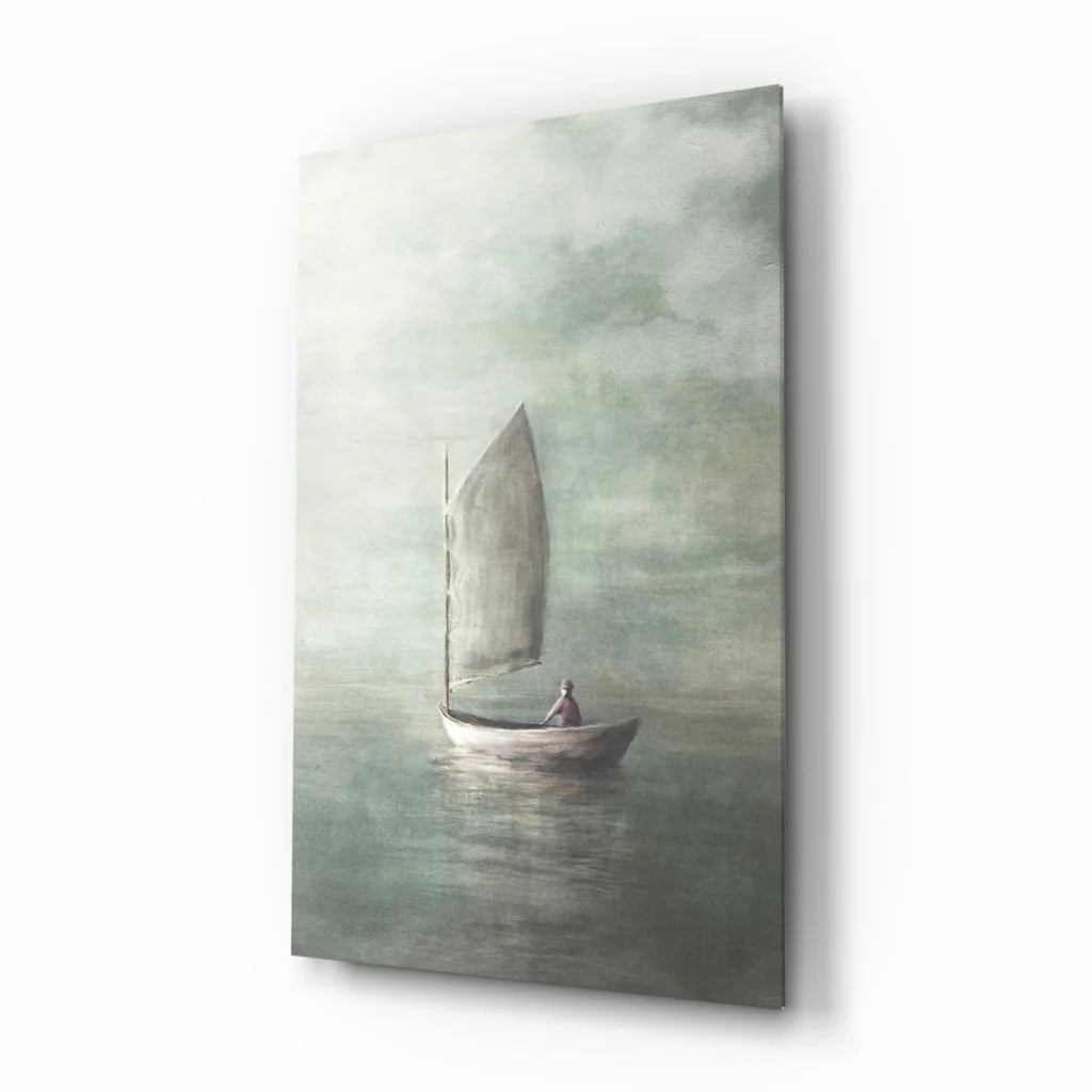 White sailboat with large sail on calm waters wall art