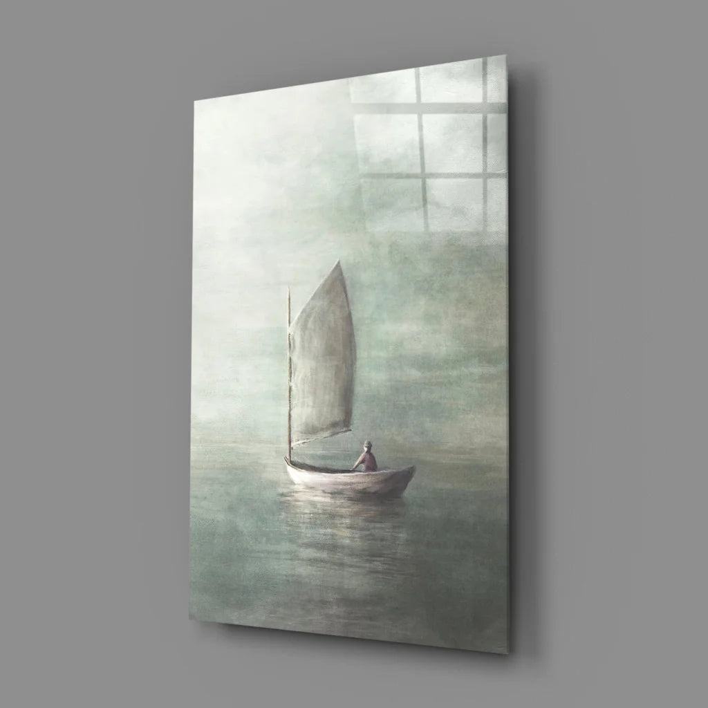 White sailboat canvas wall art with gray sails on greenish-blue water