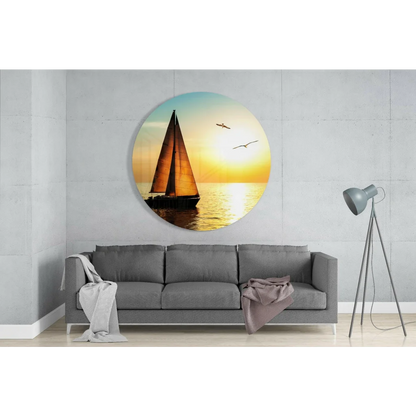 Sunset sailboat tempered glass art on concrete wall