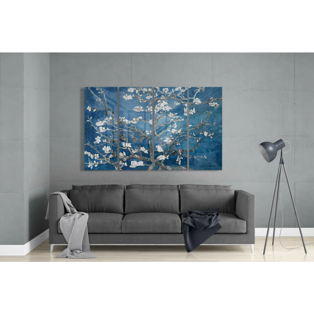 Modern blue blossom wall art canvas set above gray sofa
