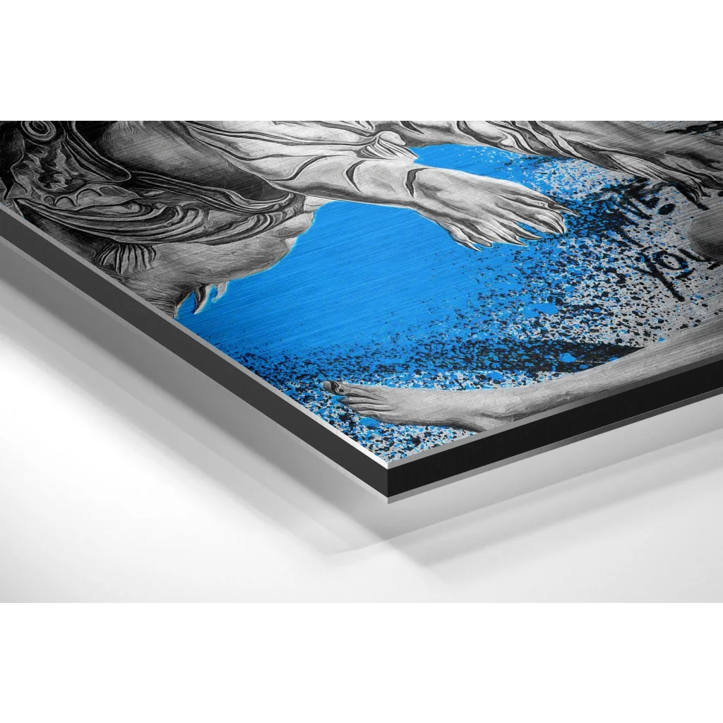 Black-framed canvas print of limbs in blue splashes on brushed aluminium dibond