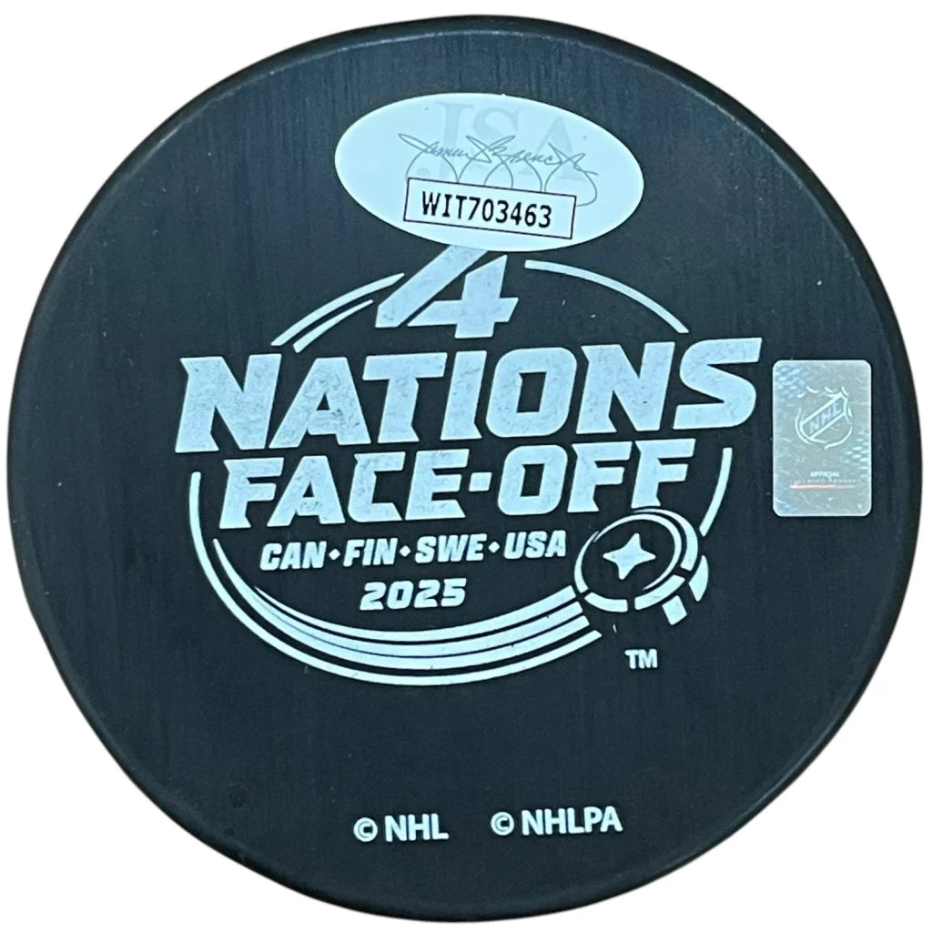 Sam Bennett autographed Team Canada 4 Nations hockey puck with Champs inscription