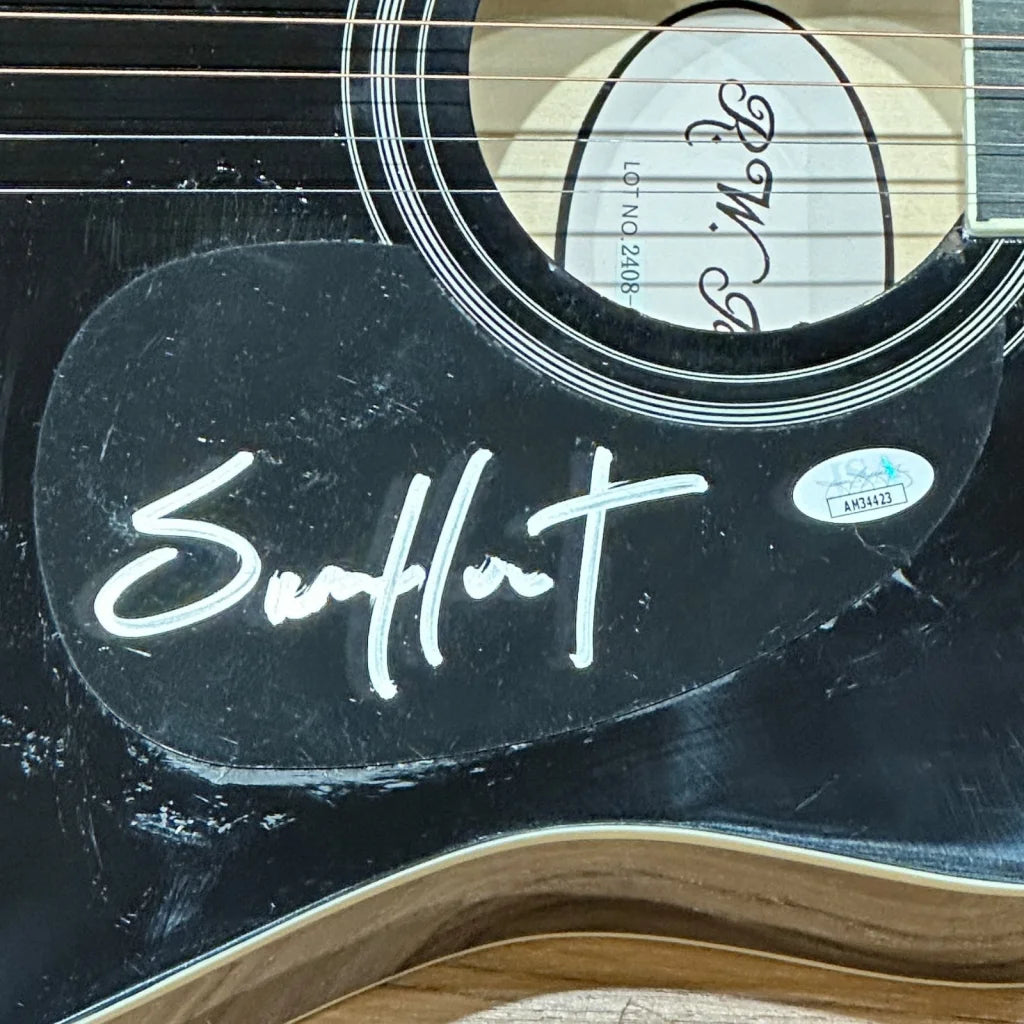 Sam Hunt autographed black acoustic guitar with JSA sticker