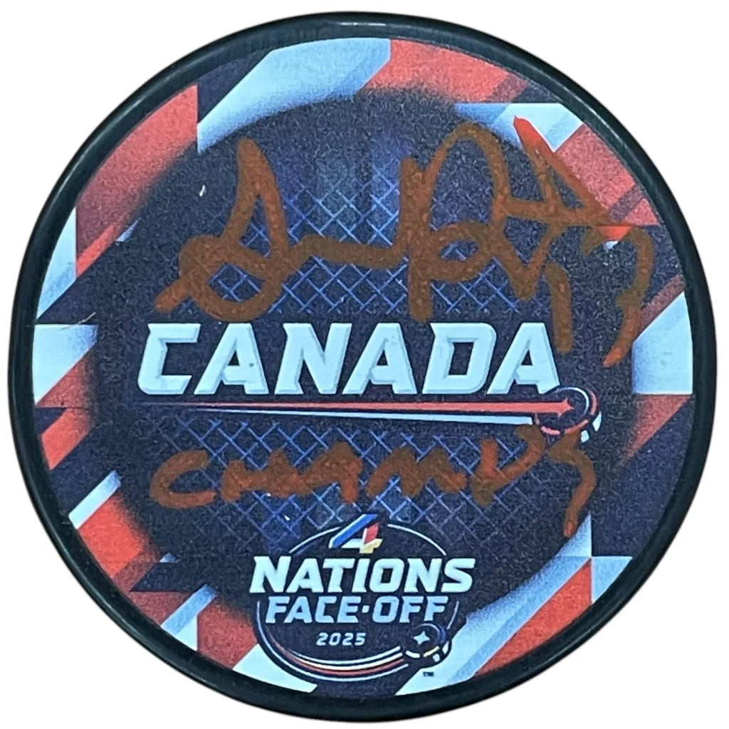 Sam Reinhart autographed Team Canada hockey puck with Champs