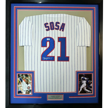 Framed Sammy Sosa autographed Chicago Cubs pinstripe jersey with photos and plaque