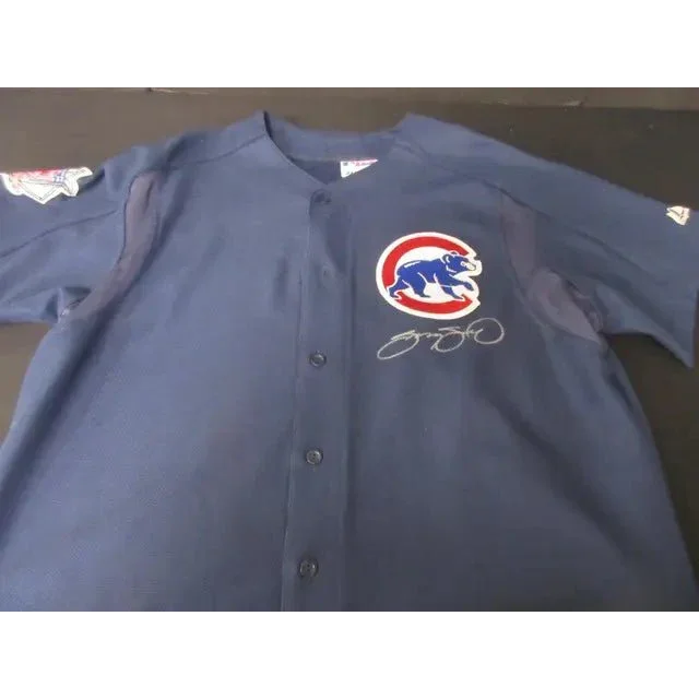 Blue Chicago Cubs baseball jersey with Sammy Sosa signed Majestic Athletic Jersey logo