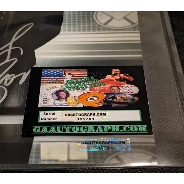 Autograph authentication sticker with serial number on Samuel L Jackson autographed 8x10 photo