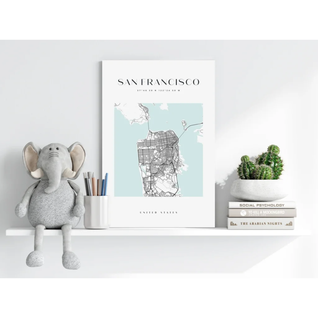 Grey plush elephant toy with floppy ears on San Francisco map print