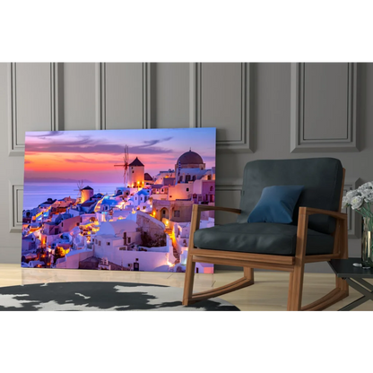Vibrant Santorini sunset glass wall art with white buildings and windmills