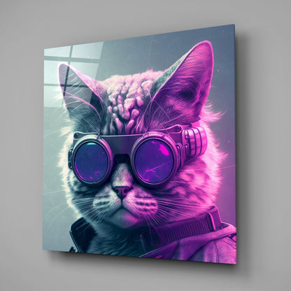 Angled view of a glass wall art panel featuring a stylized cat wearing purple-tinted goggles and jacket against cyan and magenta gradient background.