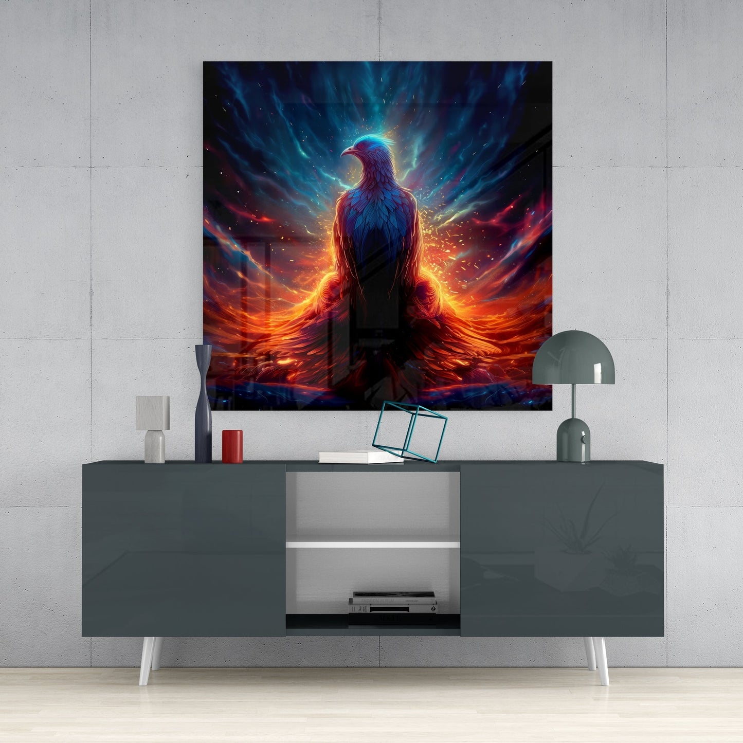 Phoenix Glass Wall Art mounted above gray media console, displaying glowing bird with orange and blue fiery wings against dark background.