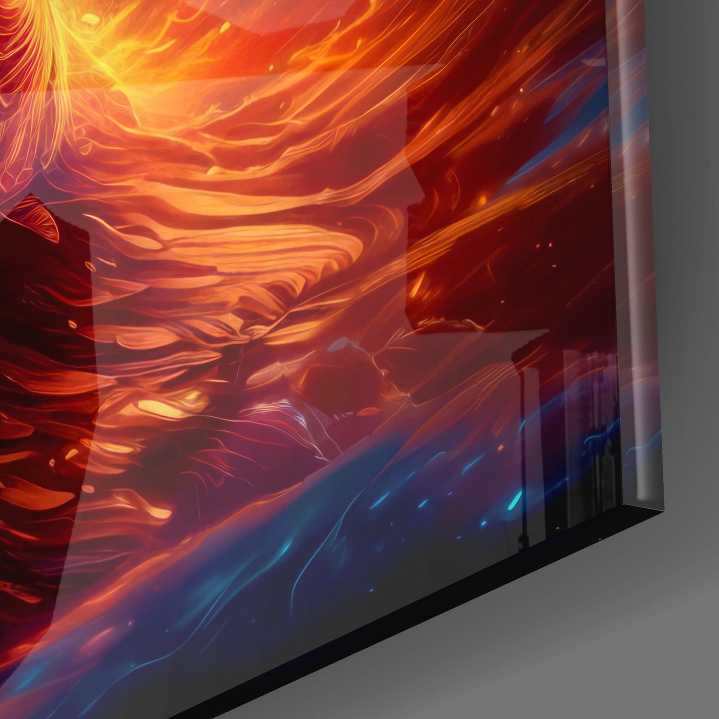 Angled view of glass wall art displaying flowing orange and yellow flames transitioning to blue at the bottom against gray background.