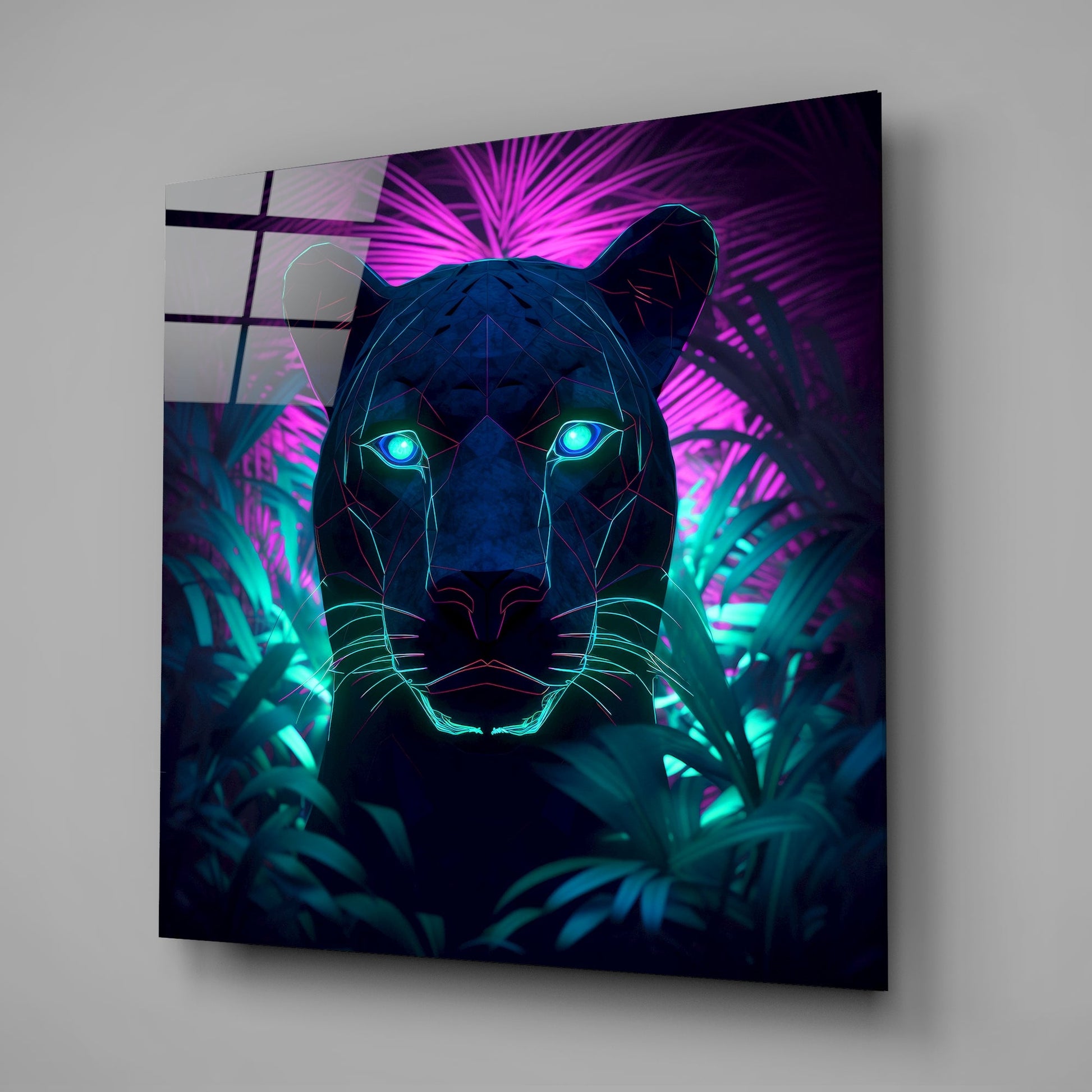 Angled perspective of neon panther glass wall art displaying cyan eyes and magenta geometric lines against dark background with tropical foliage.